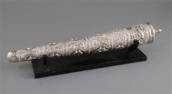 A Burmese embossed silver horn-shaped scroll holder and cover on hardwood stand, 41.5cm